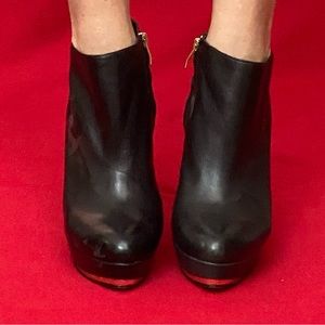 Black soft-as-butter stiletto leather ankle boots size 11